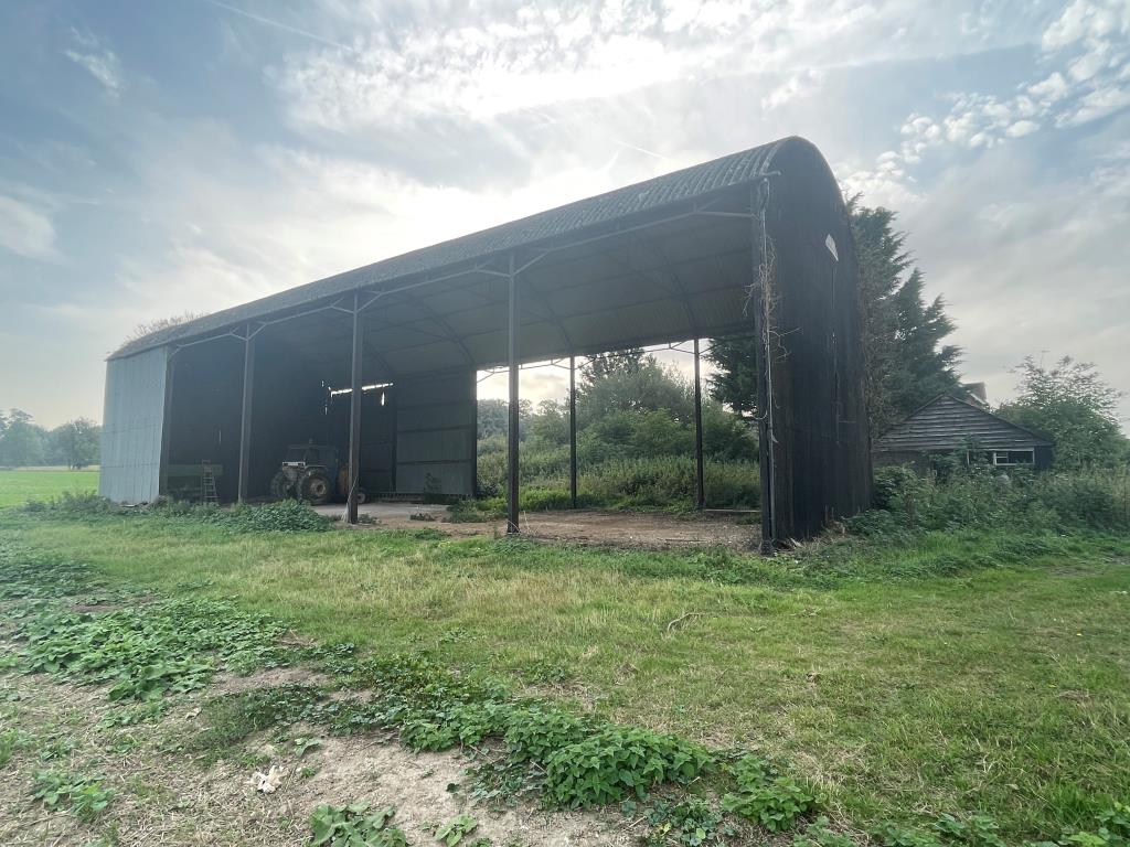 Lot: 145 - DETACHED COTTAGE ON TWO ACRE PLOT WITH DILAPIDATED BARN AND HARDSTANDING - Dutch style barn